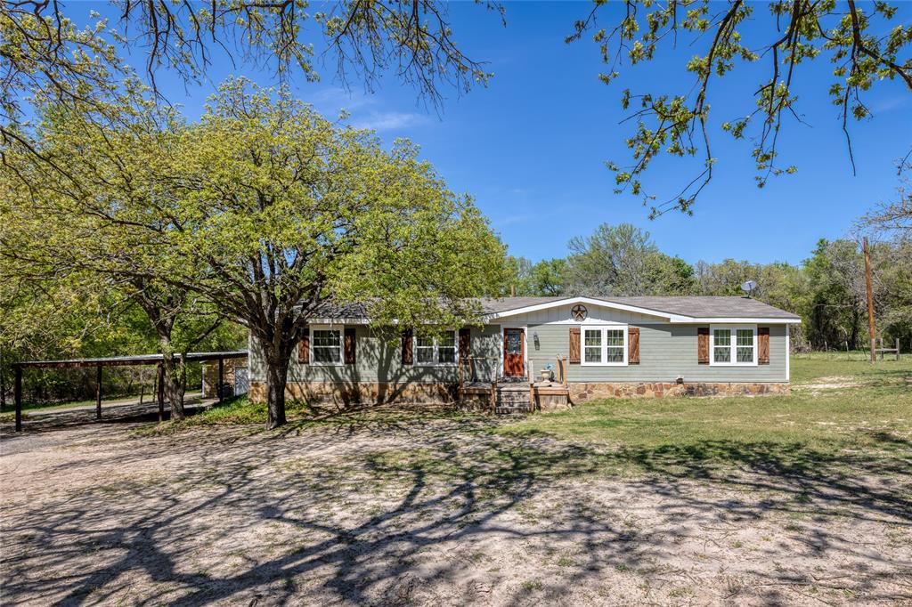 1701 Central Road Weatherford, TX 76088 - Photo 38 of 40 Single story home featuring a 2 car carport on a wooded acre.