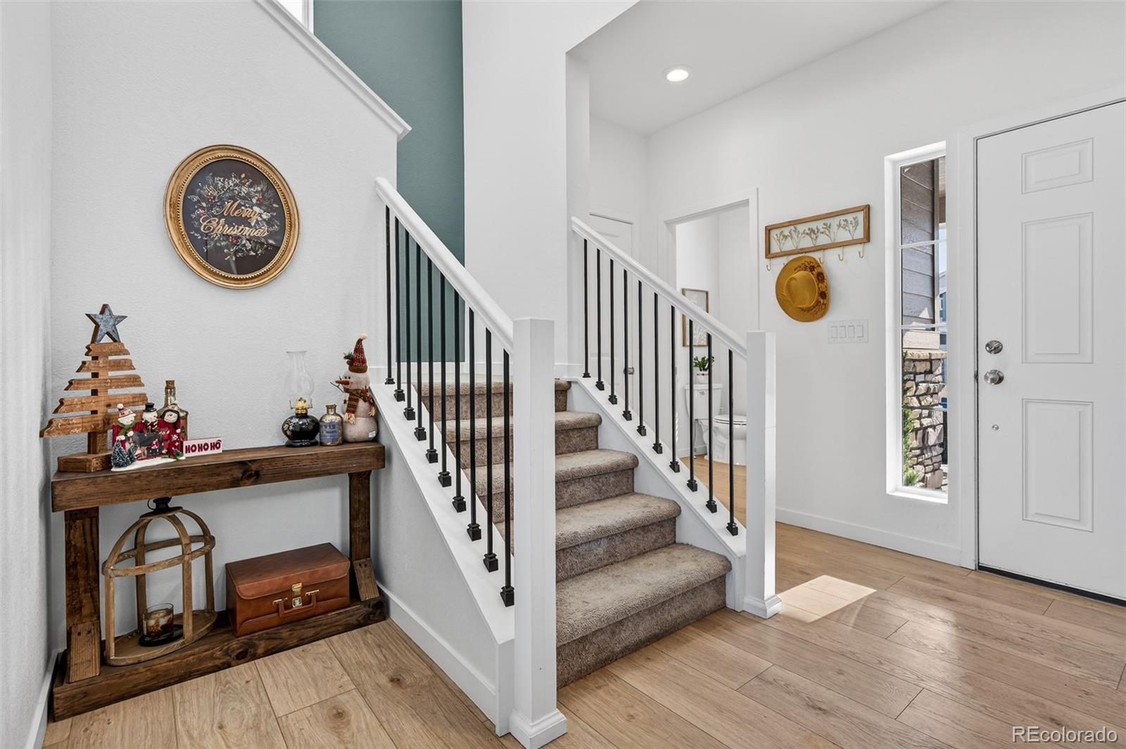 233 Corkscrew Street Elizabeth, CO 80107 - Photo 3 of 33 a view of entryway with wooden floor