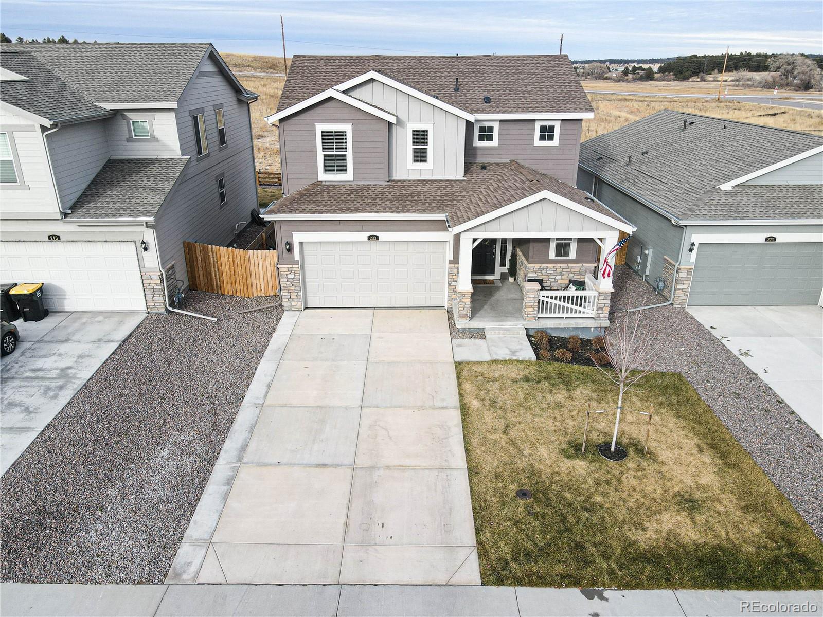 233 Corkscrew Street Elizabeth, CO 80107 - Photo 31 of 33 an aerial view of a house with swimming pool