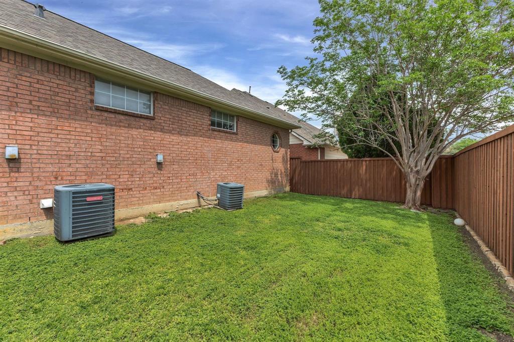 7524 Aberdon Road Dallas, TX 75252 - Photo 29 of 39 View of yard featuring cooling unit and a fenced backyard