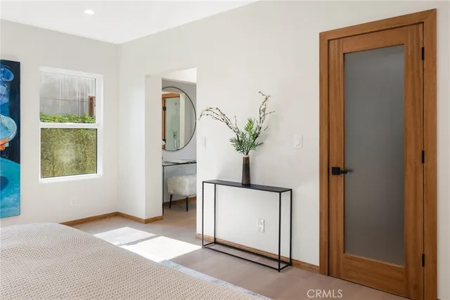 a view of livingroom with hardwood floor and a window