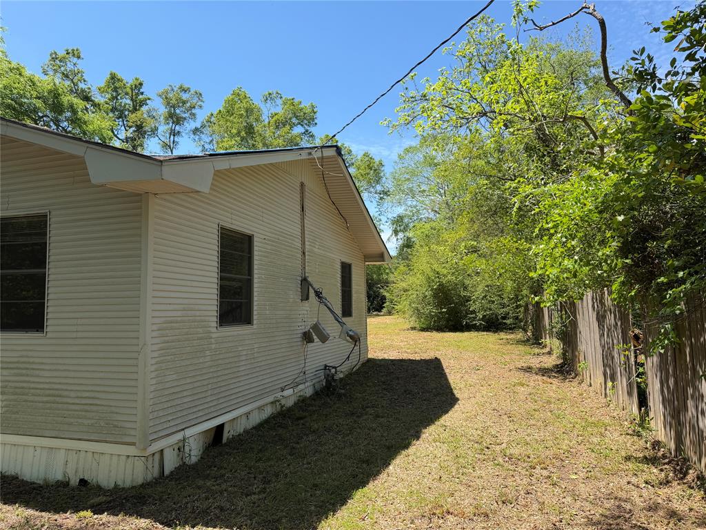336 Butler Street Rusk, TX 75785 - Photo 8 of 27 a view of a house with a yard