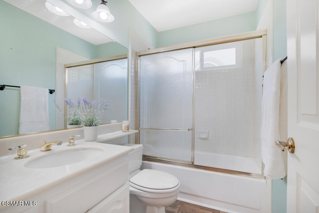 5339 Seneca Place Simi Valley, CA 93063 - Photo 35 of 76 a bathroom with a sink a toilet and shower