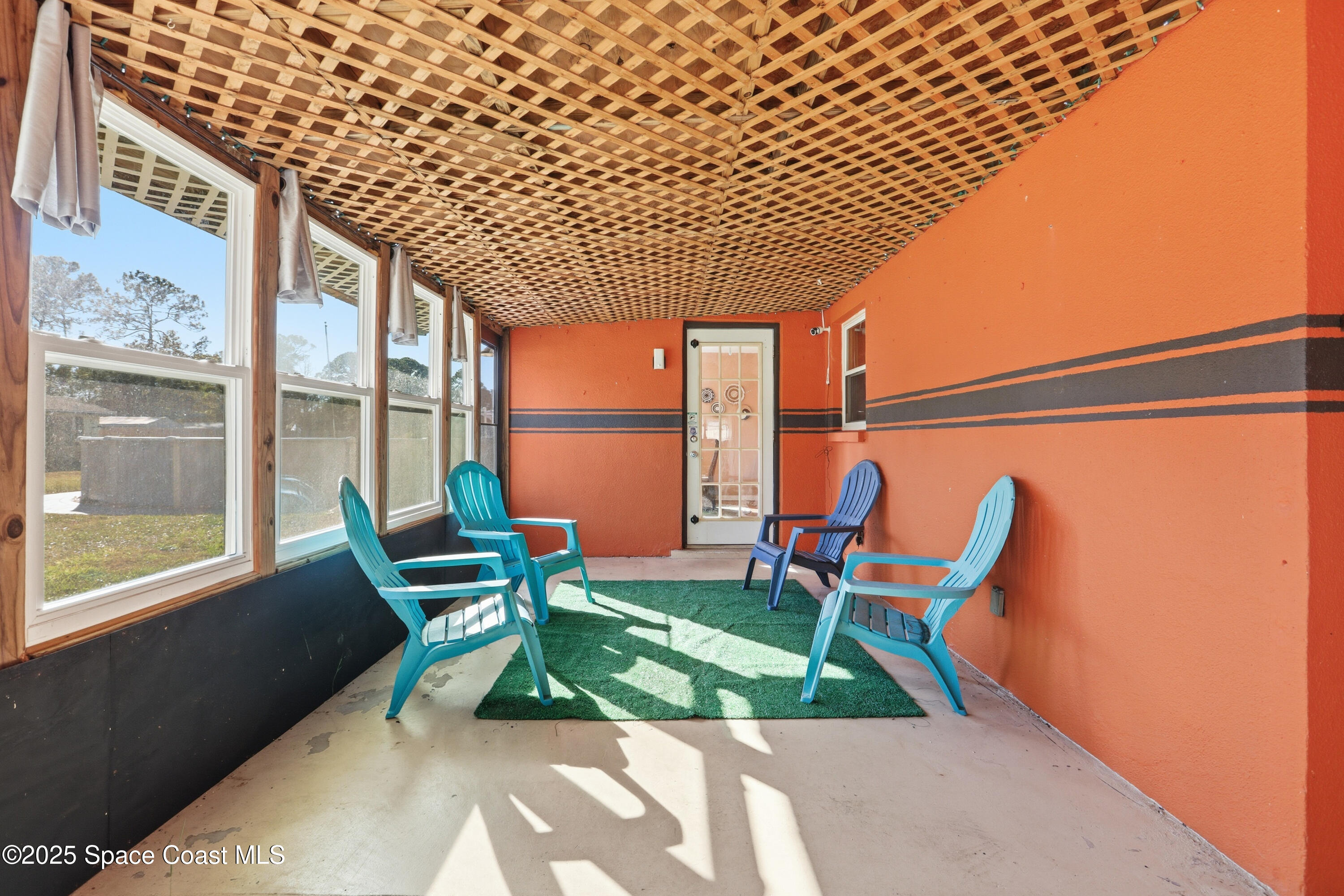 3929 Burkholm Road Mims, FL 32754 - Photo 29 of 51 Enclosed Porch