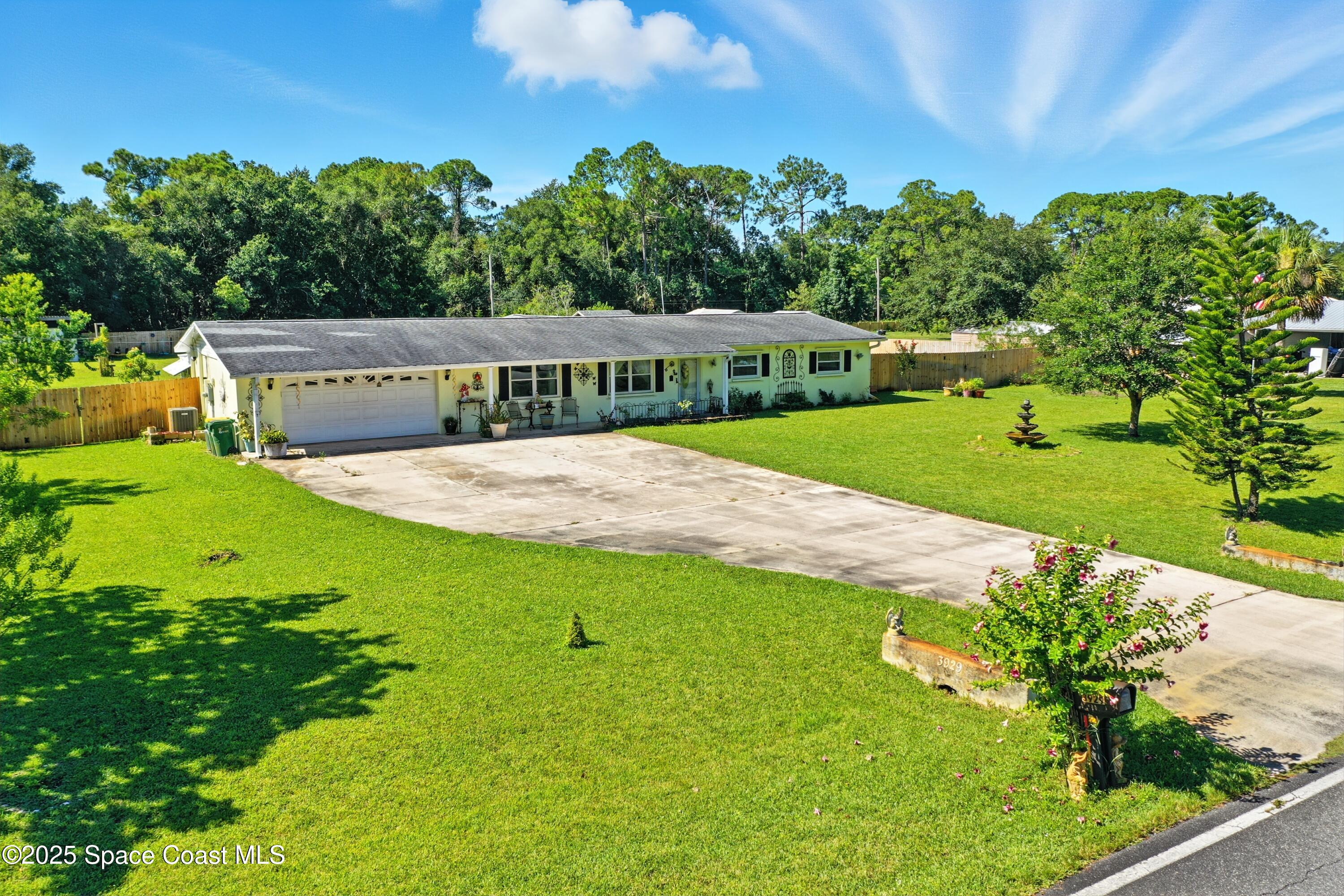 3929 Burkholm Road Mims, FL 32754 - Photo 36 of 51 Side View