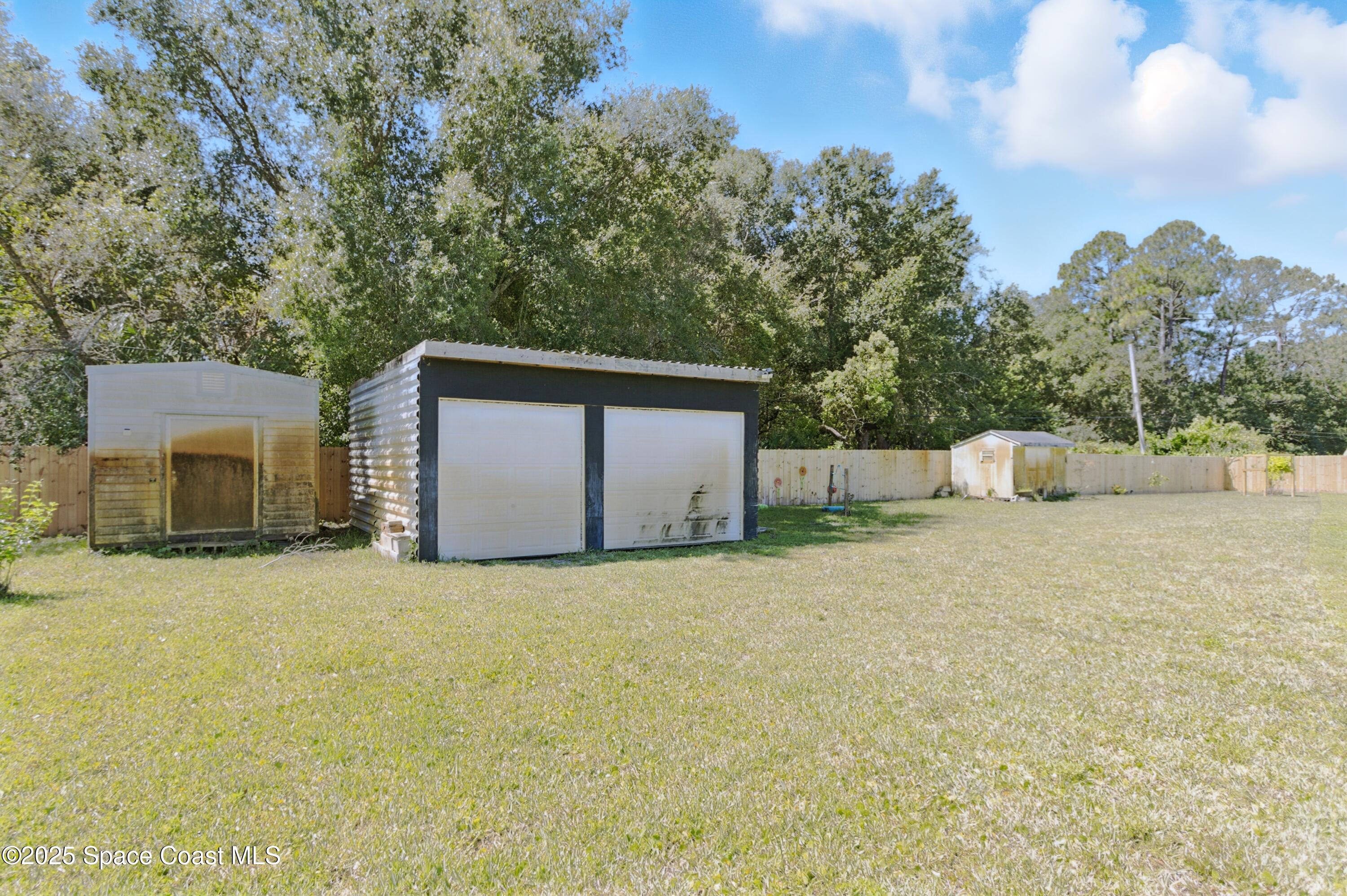 3929 Burkholm Road Mims, FL 32754 - Photo 39 of 51 Storage Shed & Detached Garage