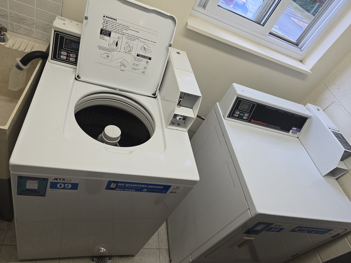 6882 West Touhy Avenue, Unit D Niles, IL 60714 - Photo 9 of 9 with utility room with dryer and washer