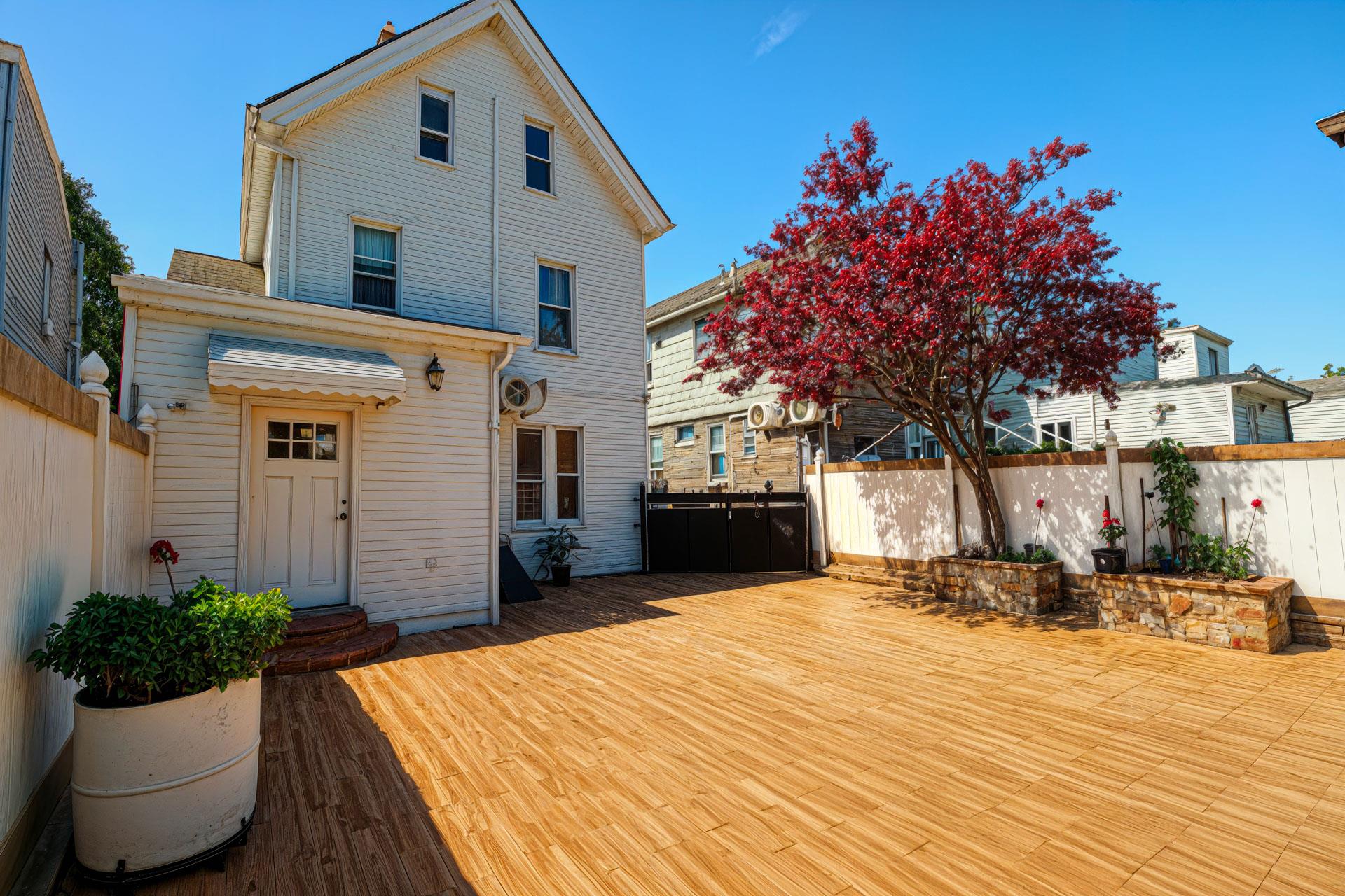 80-63 87th Road Queens, NY 11421 - Photo 24 of 24 a front view of a house with a patio