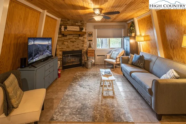 a kitchen with stainless steel appliances a refrigerator and a stove