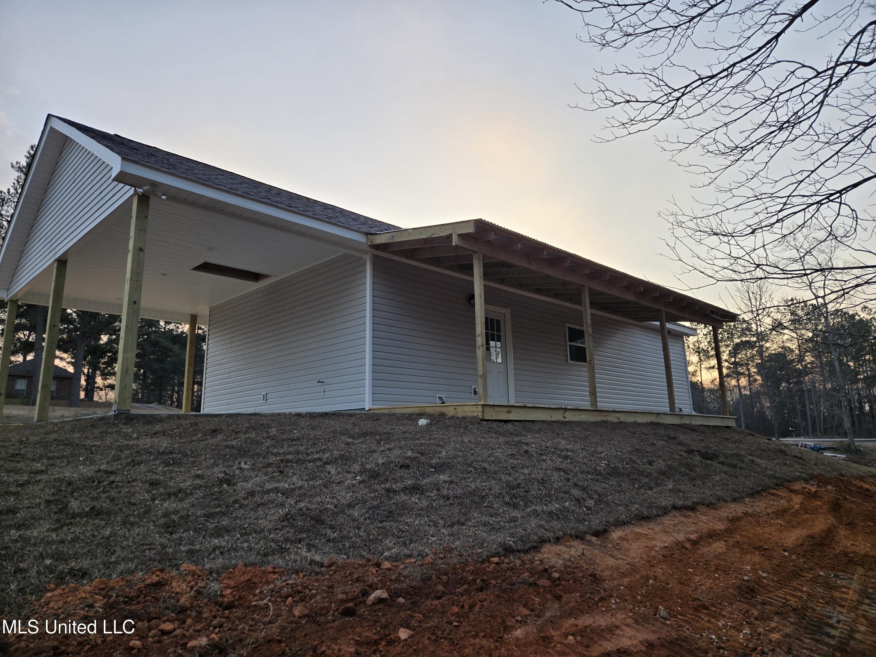 405 George Ford Road Carriere, MS 39426 - Photo 4 of 19 Rear View and cover deck