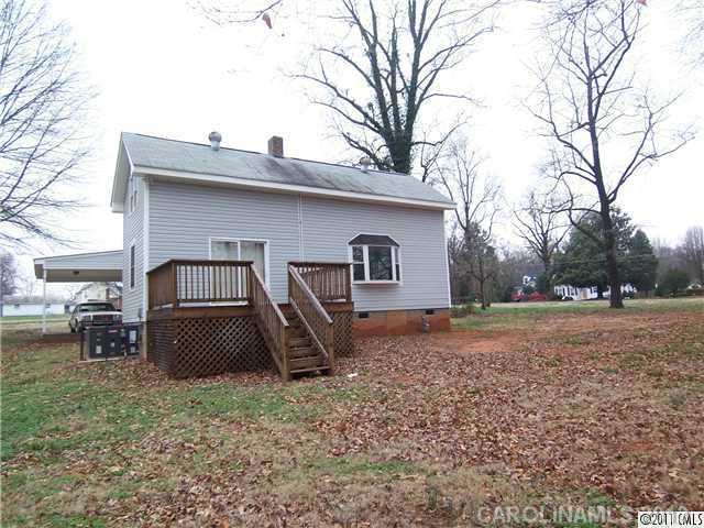 2717 Toddville Road Charlotte, NC 28214 - Photo 2 of 11 a backyard of a house with barbeque oven