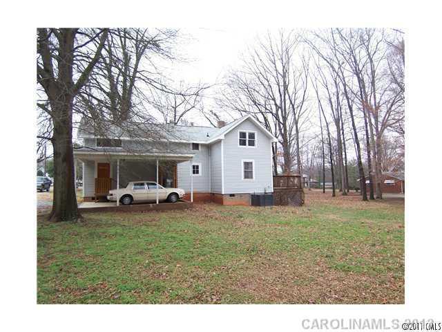 2717 Toddville Road Charlotte, NC 28214 - Photo 3 of 11 a view of a house with a back yard