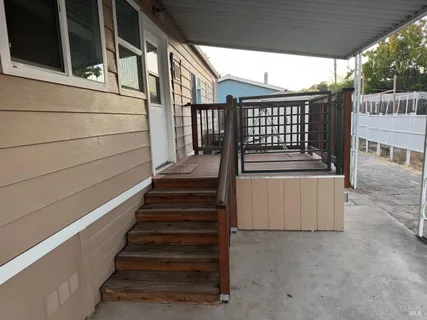 a view of a house with a deck