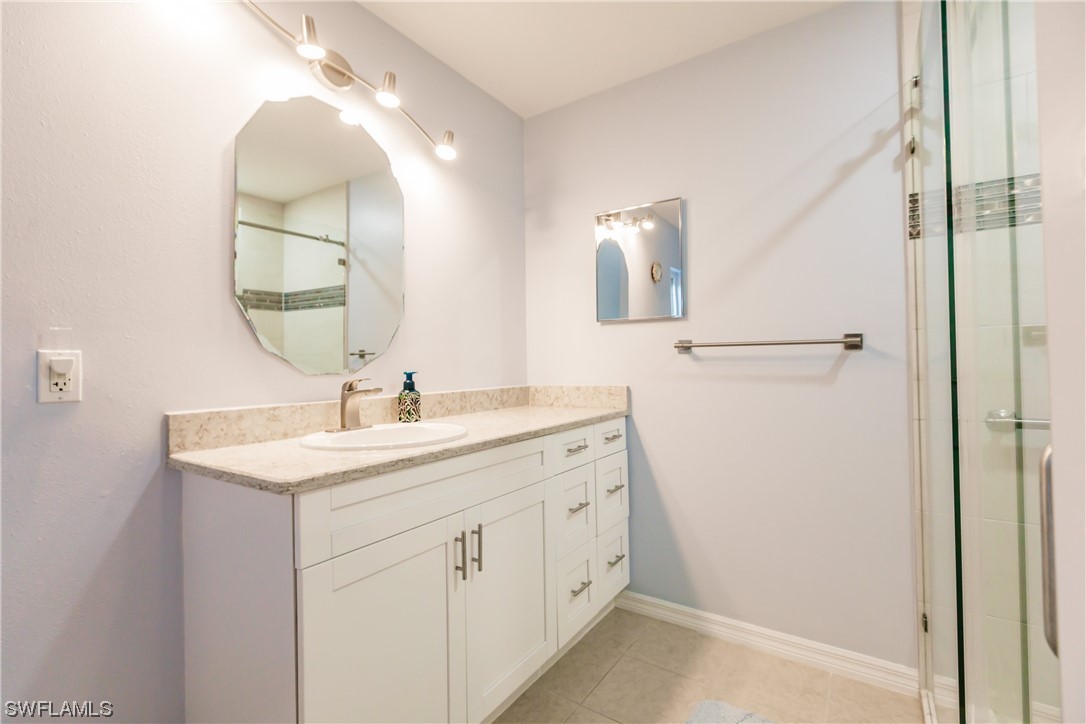 217 Manatee Street Fort Myers, FL 33913 - Photo 20 of 38 a bathroom with a sink and a mirror