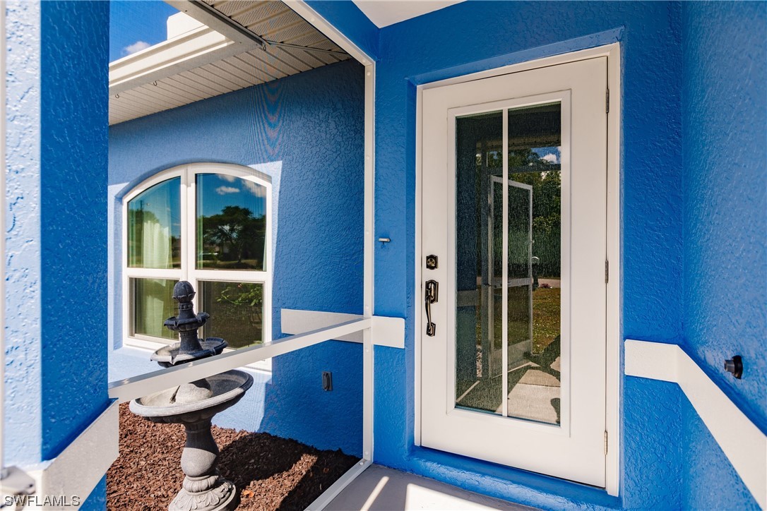 217 Manatee Street Fort Myers, FL 33913 - Photo 2 of 38 a room with furniture and windows