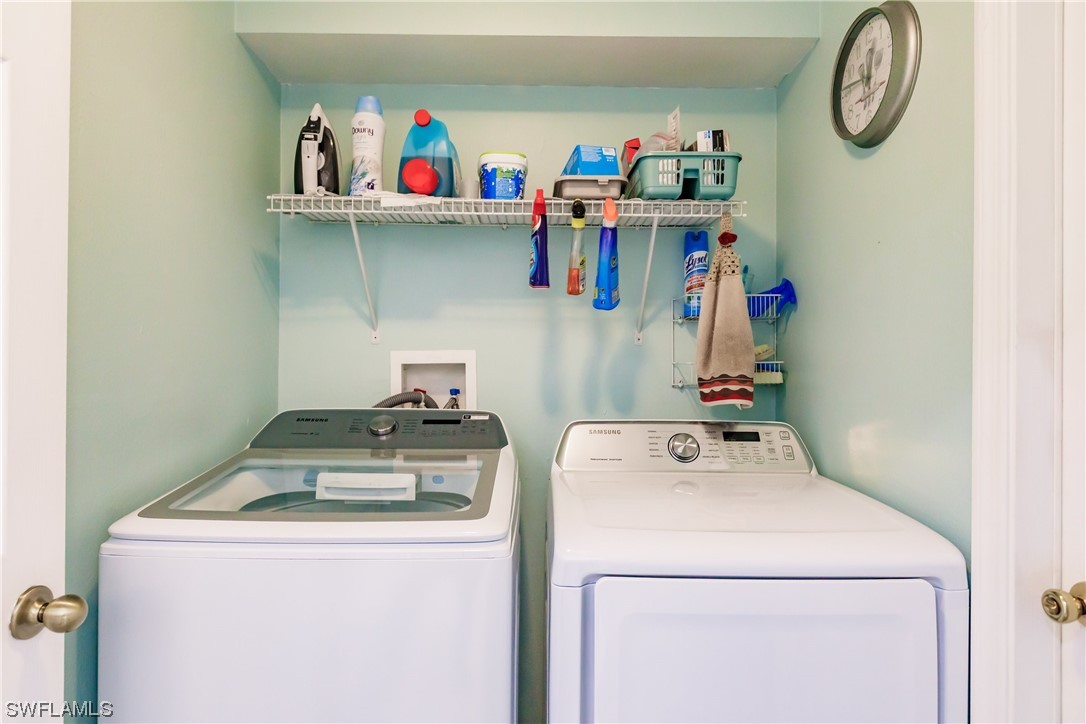 217 Manatee Street Fort Myers, FL 33913 - Photo 25 of 38 a utility room with dryer and washer