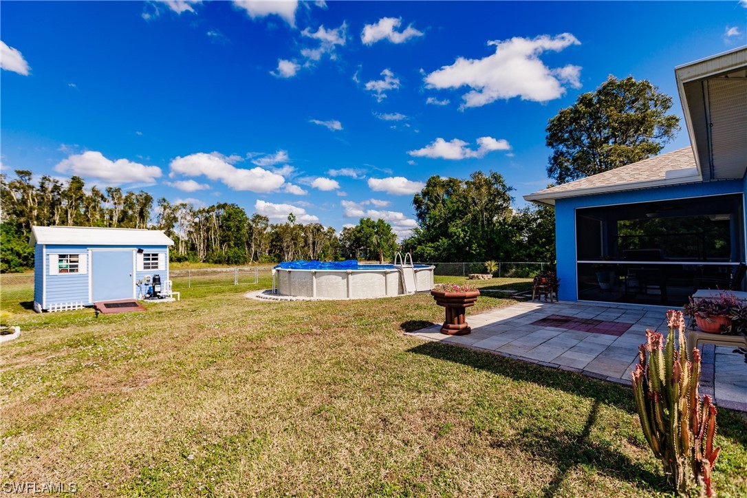 217 Manatee Street Fort Myers, FL 33913 - Photo 36 of 38 a view of a backyard with sitting area