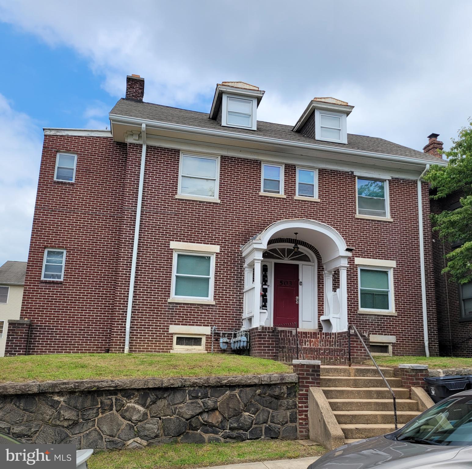 503 North Rodney Street, Unit 3A Wilmington, DE 19805 - Photo 1 of 18 a front view of a house with garden