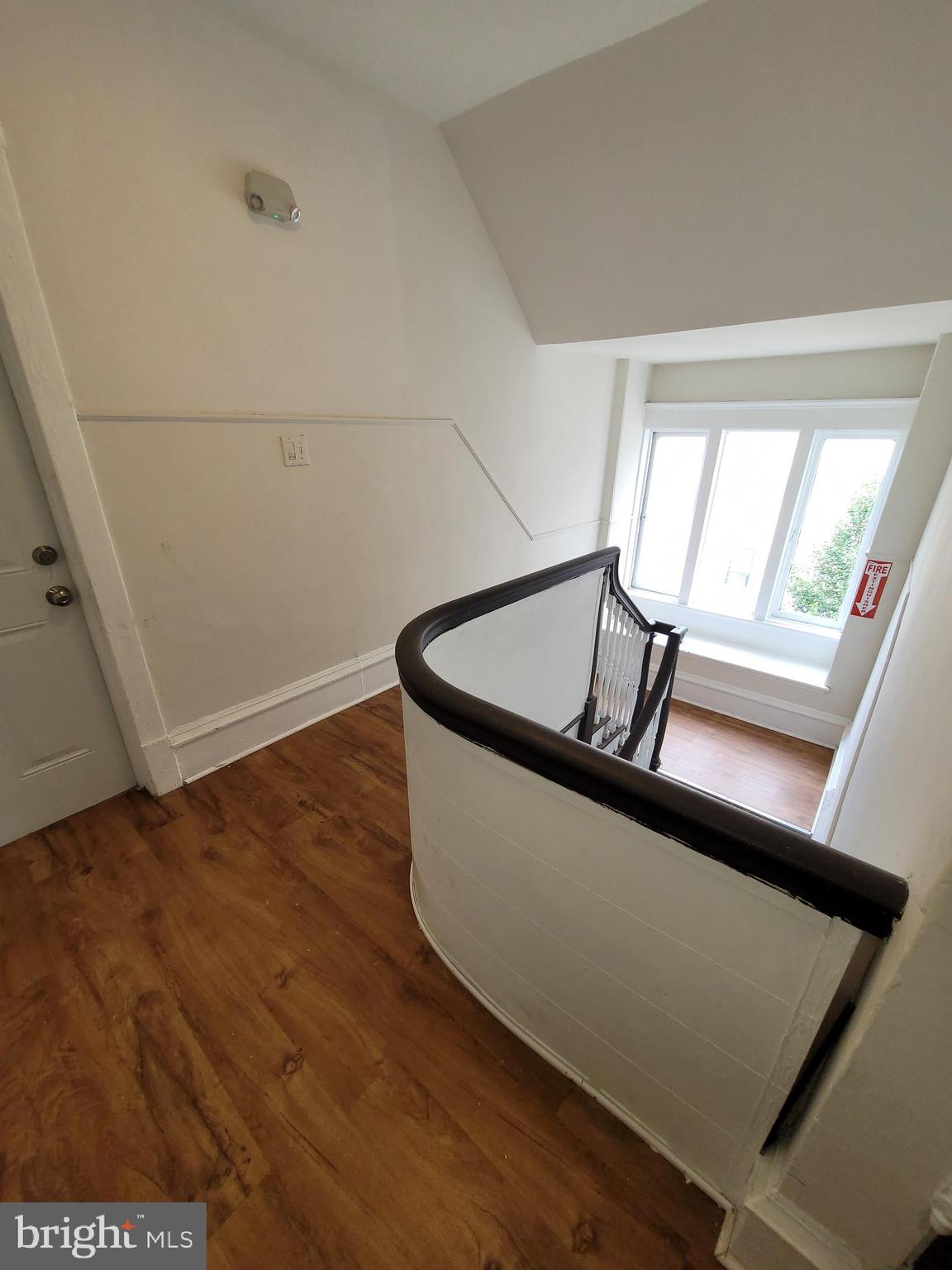 503 North Rodney Street, Unit 3A Wilmington, DE 19805 - Photo 3 of 18 a view of staircase with wooden floor