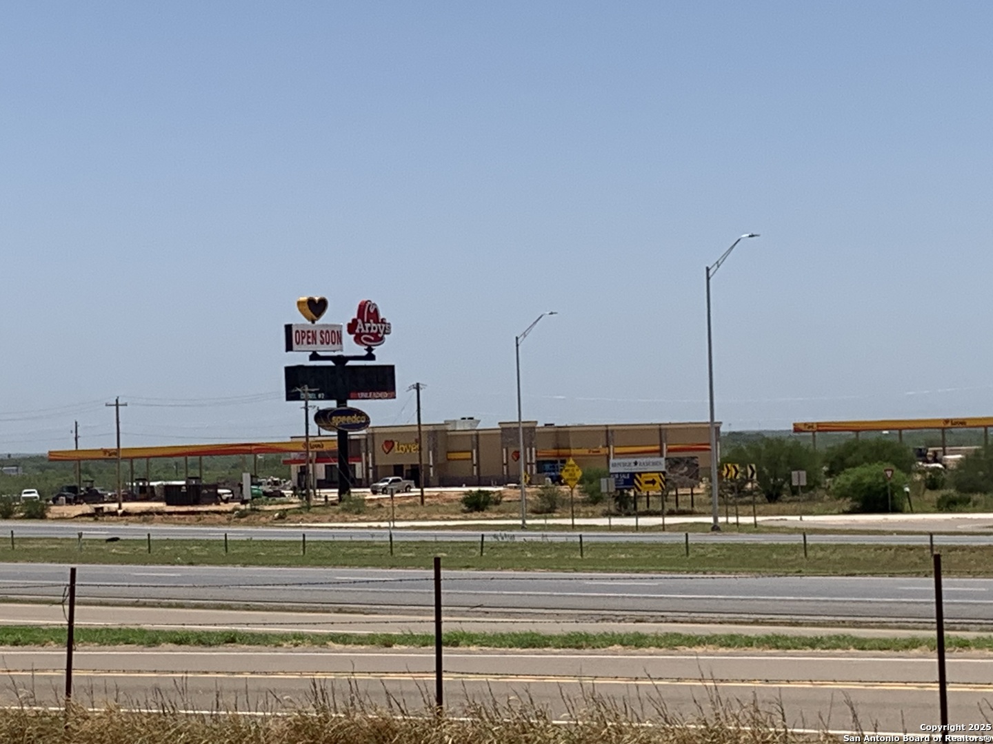 2438 Interstate 35 Cotulla, TX 78014 - Photo 9 of 9 a view of building with yard