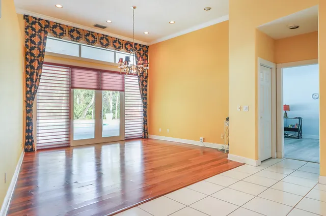 a view of a kitchen with kitchen appliances