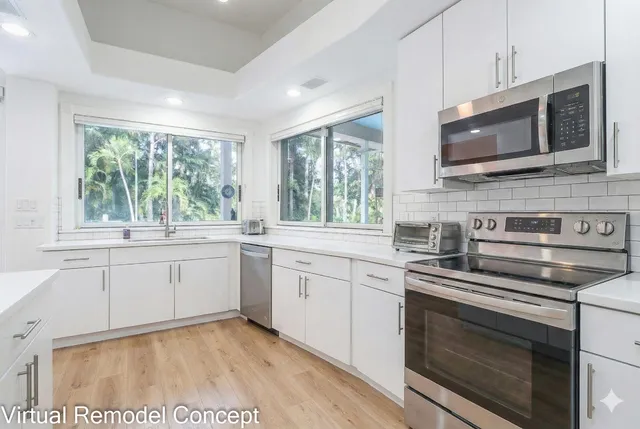 a bathroom with a sink toilet and a mirror