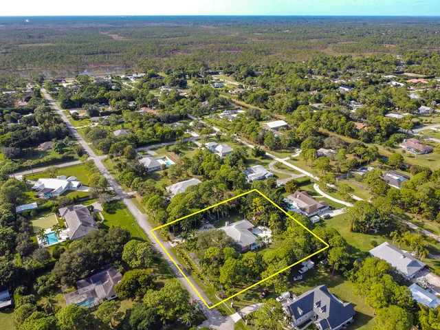 a view of an entryway with a chandelier