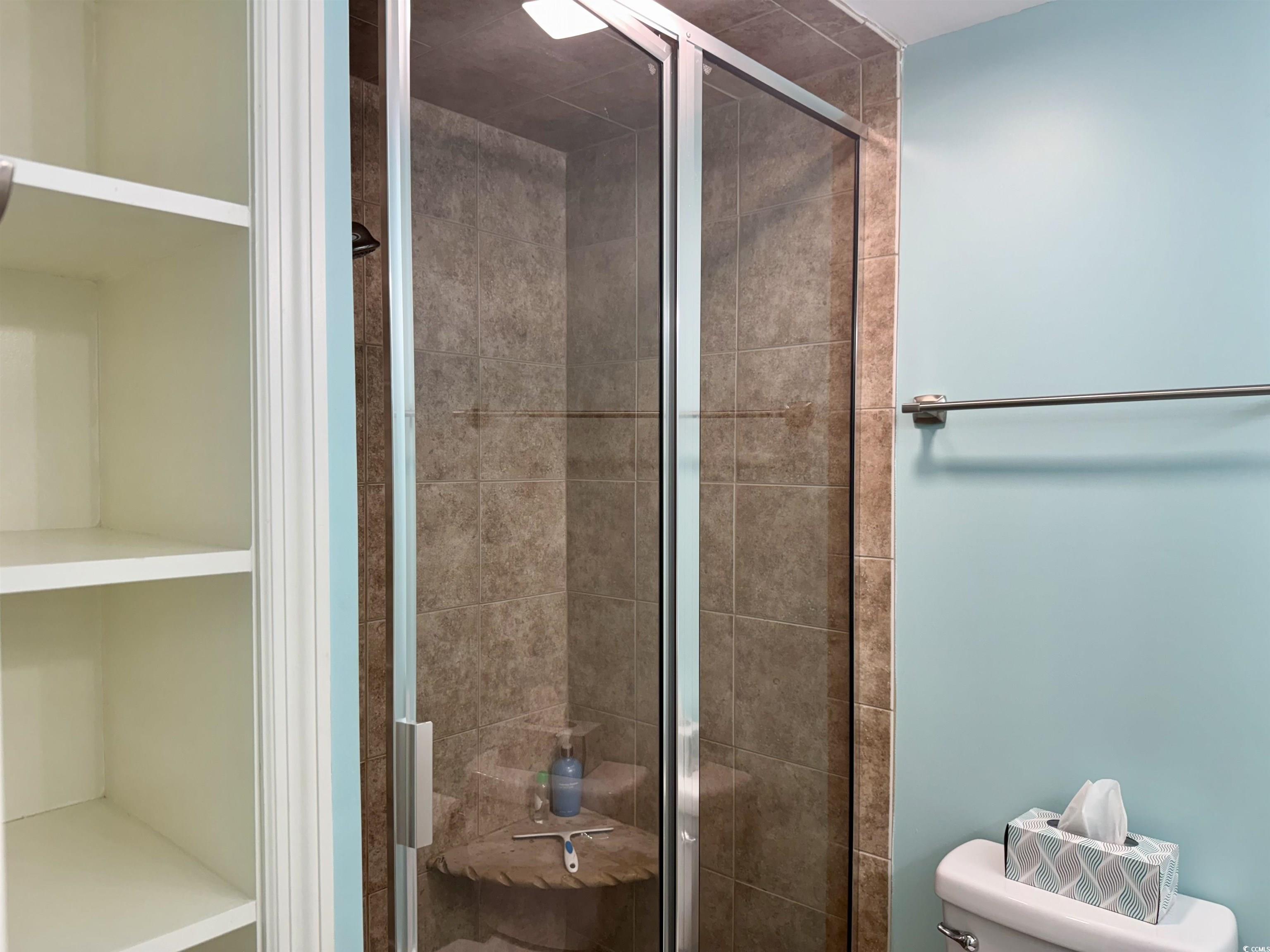 416 Oceanside Drive Surfside Beach, SC 29575 - Photo 20 of 37 Bathroom featuring a stall shower