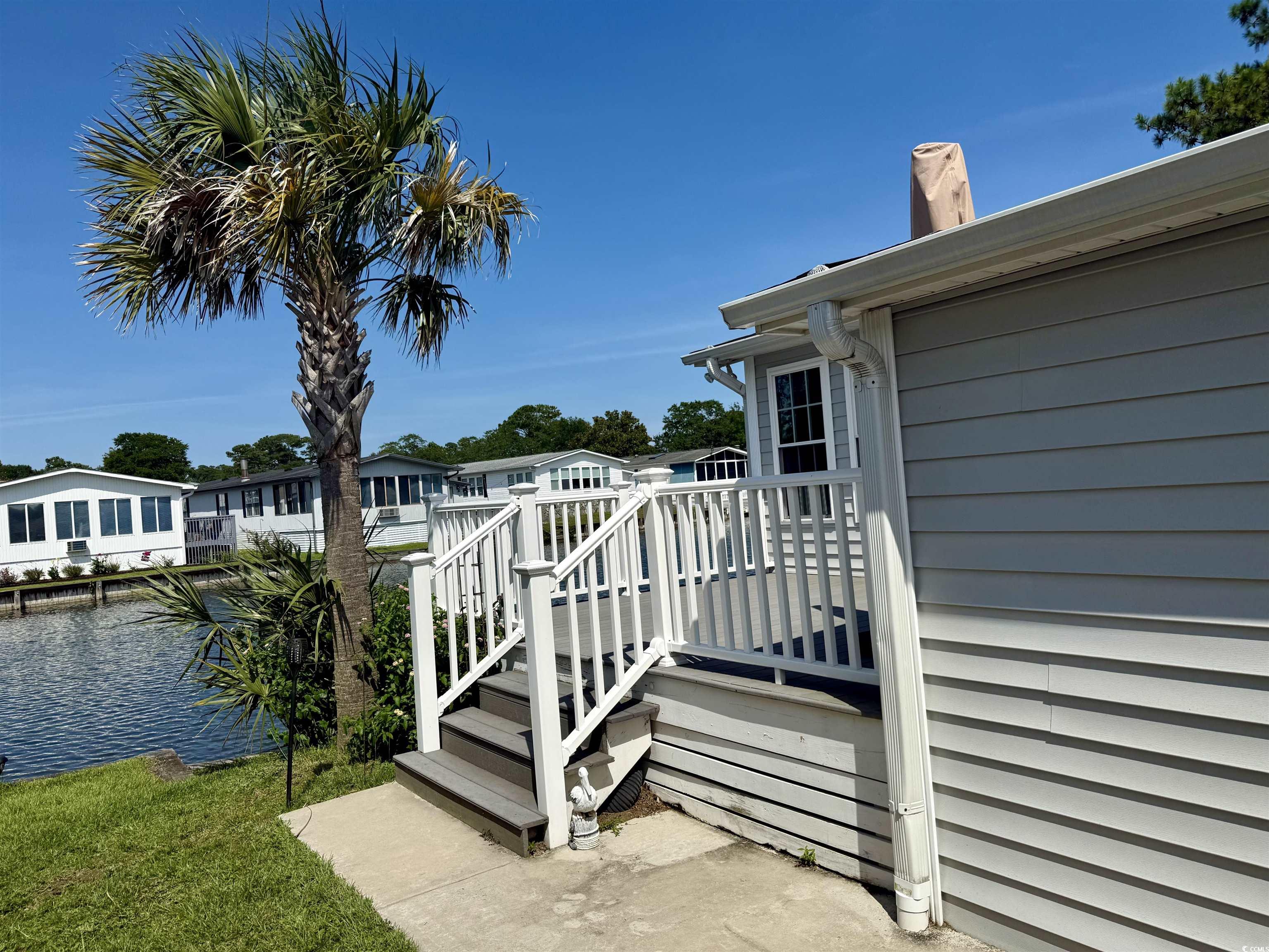 416 Oceanside Drive Surfside Beach, SC 29575 - Photo 25 of 37 Wooden deck with a water view