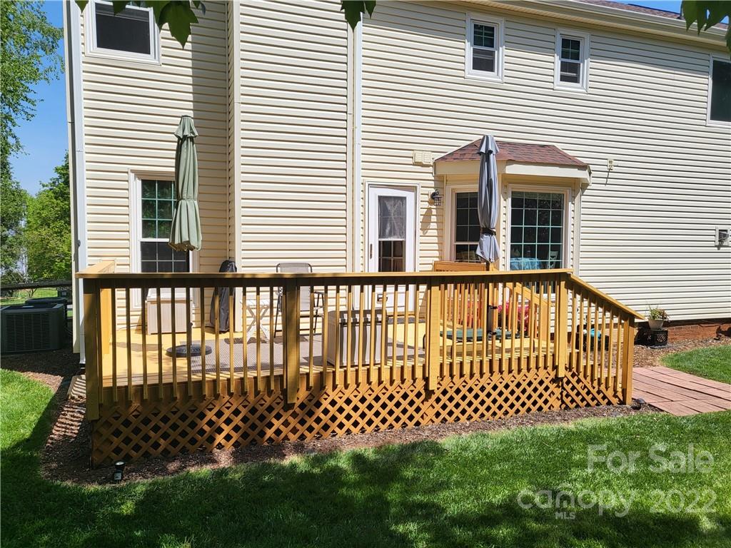 9216 Torrence Crossing Drive Huntersville, NC 28078 - Photo 14 of 34 a view of a house with a small yard