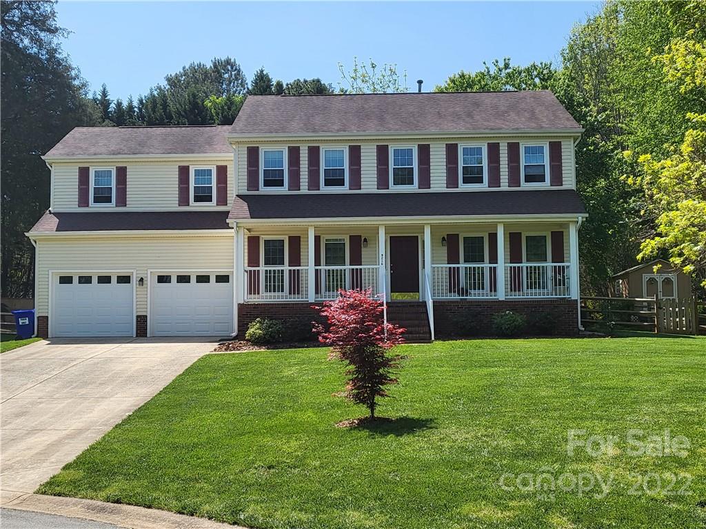 9216 Torrence Crossing Drive Huntersville, NC 28078 - Photo 2 of 34 a front view of a house with a yard