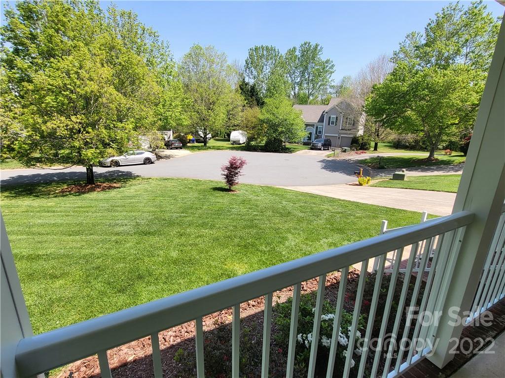 9216 Torrence Crossing Drive Huntersville, NC 28078 - Photo 4 of 34 a view of a garden and trees