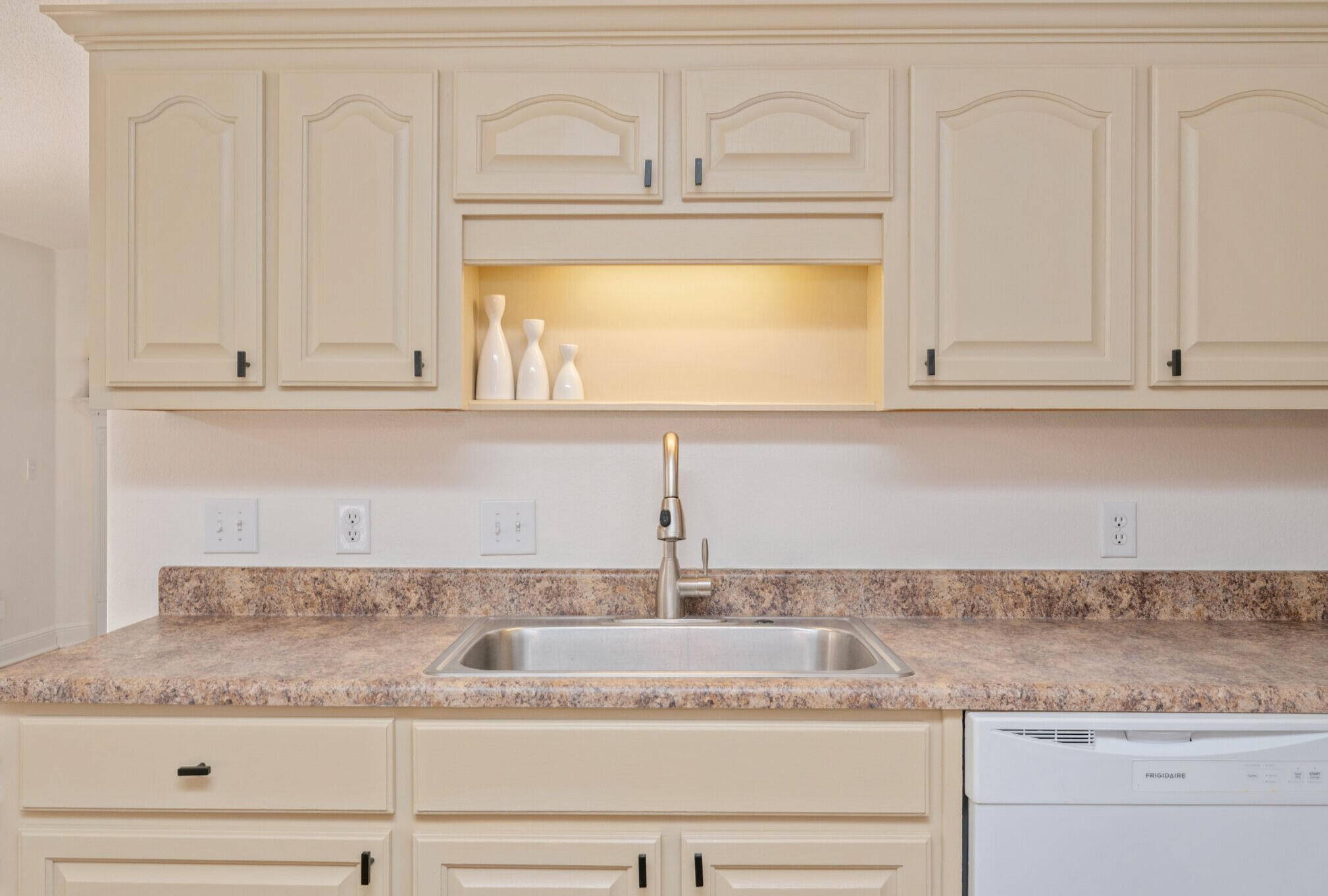 416 Swift Fox Run Crestview, FL 32536 - Photo 13 of 32 a kitchen with granite countertop white cabinets and a sink