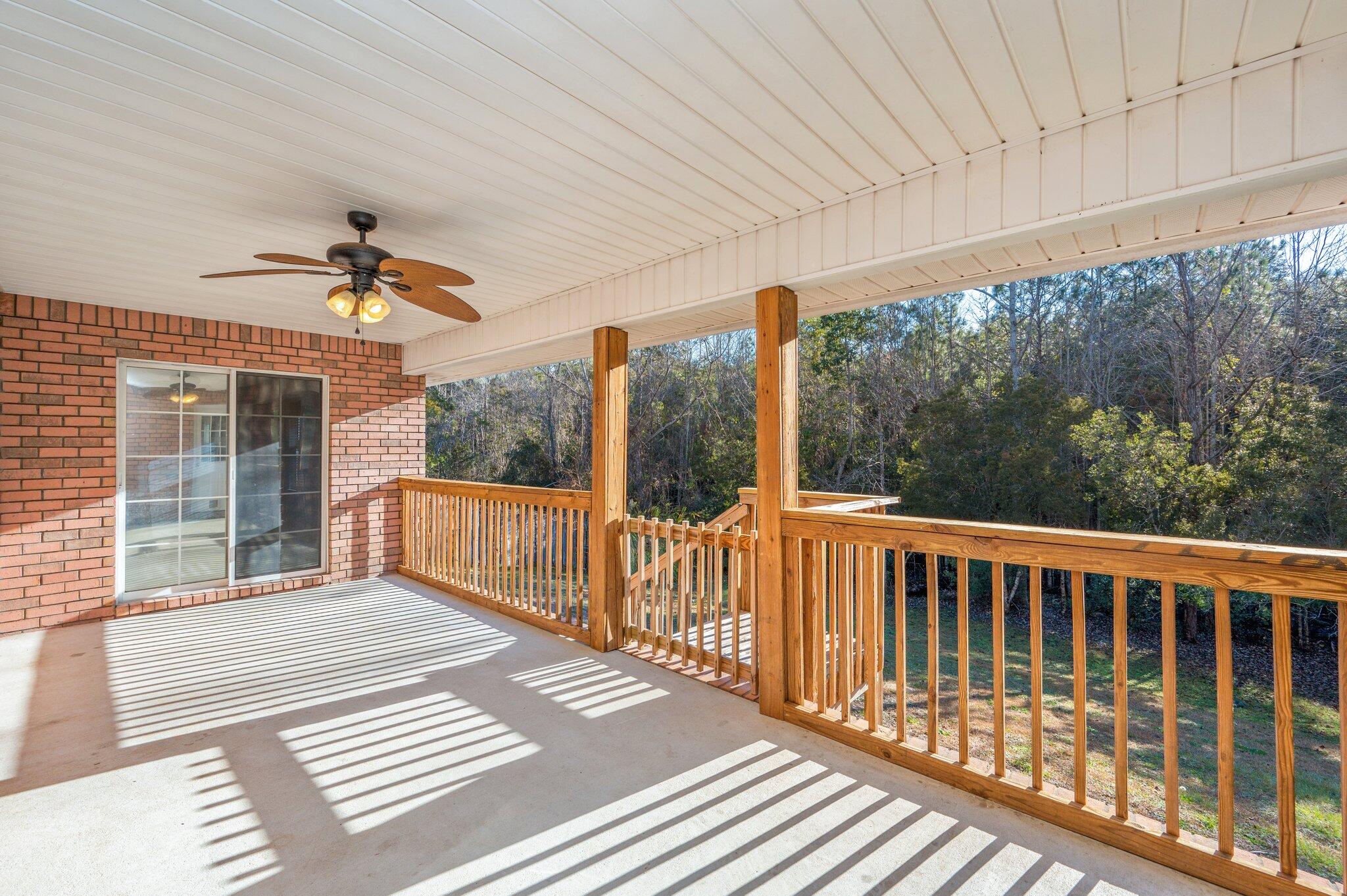 416 Swift Fox Run Crestview, FL 32536 - Photo 27 of 32 a view of a two chairs in the balcony