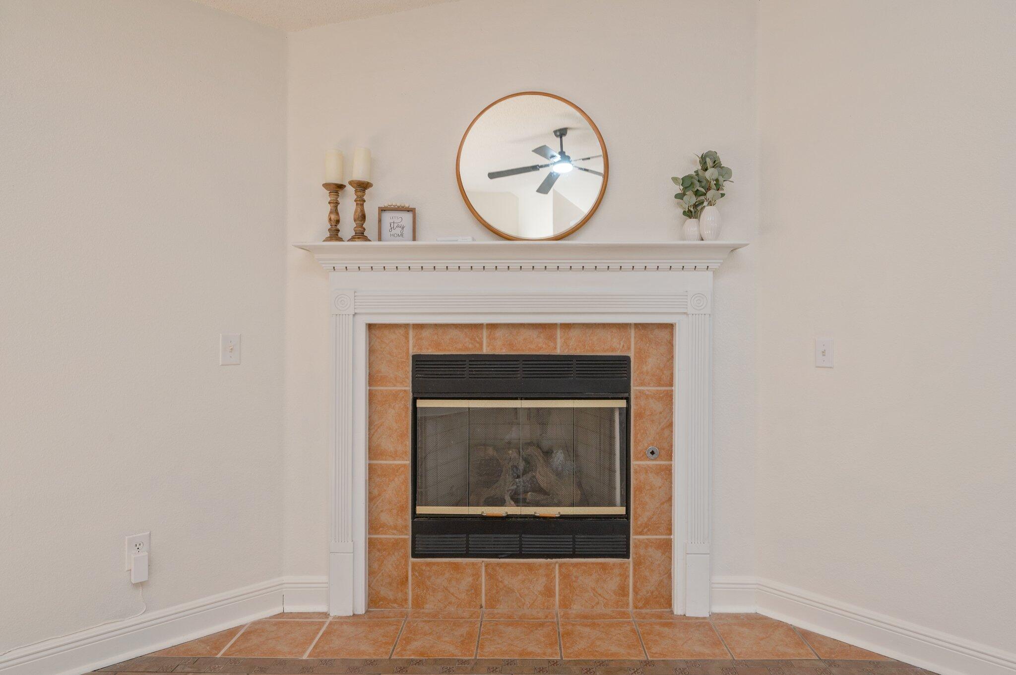 416 Swift Fox Run Crestview, FL 32536 - Photo 7 of 32 a stone house with a clock on it
