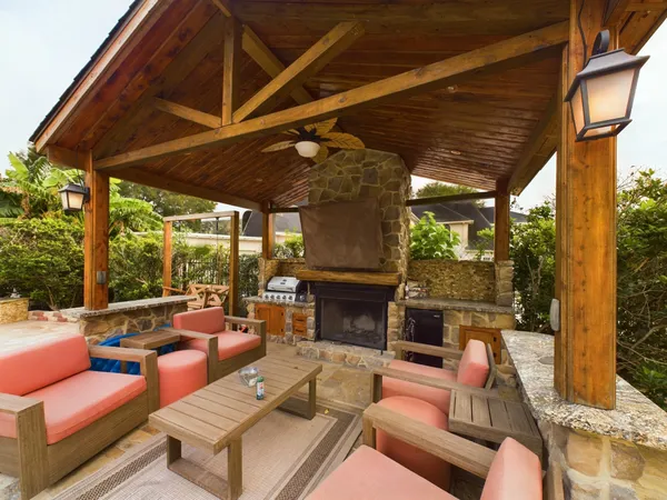 a view of a house with a yard porch and sitting area