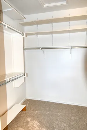 a bathroom with a sink toilet and mirror