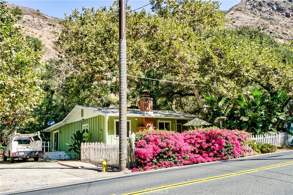 29501 Silverado Canyon Road Silverado, CA 92676 - Photo 26 of 49 Front view of this well kept home. Love the privacy & beauty the bougainvillea & oak trees give.