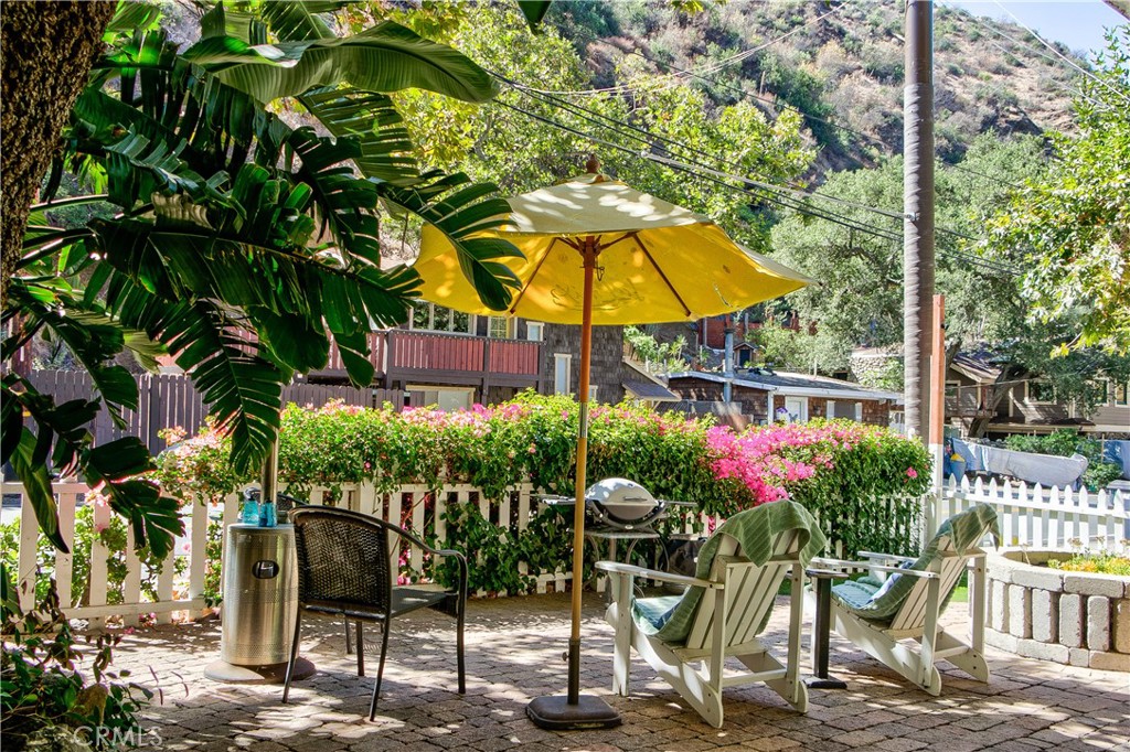 29501 Silverado Canyon Road Silverado, CA 92676 - Photo 6 of 44 Private front courtyard with bougainvillea in the front, trees on the side.