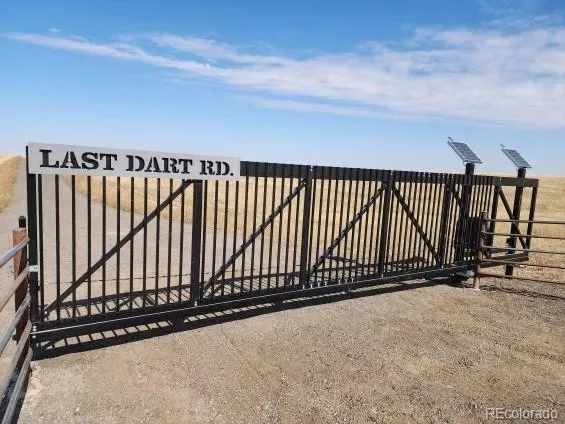 a view of swimming pool with furniture