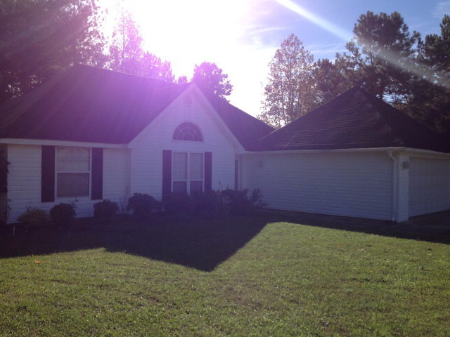 101 Ridgeview Drive Buckhead, GA 30625 - Photo 24 of 30 a backyard of a house with lots of green space and outdoor seating