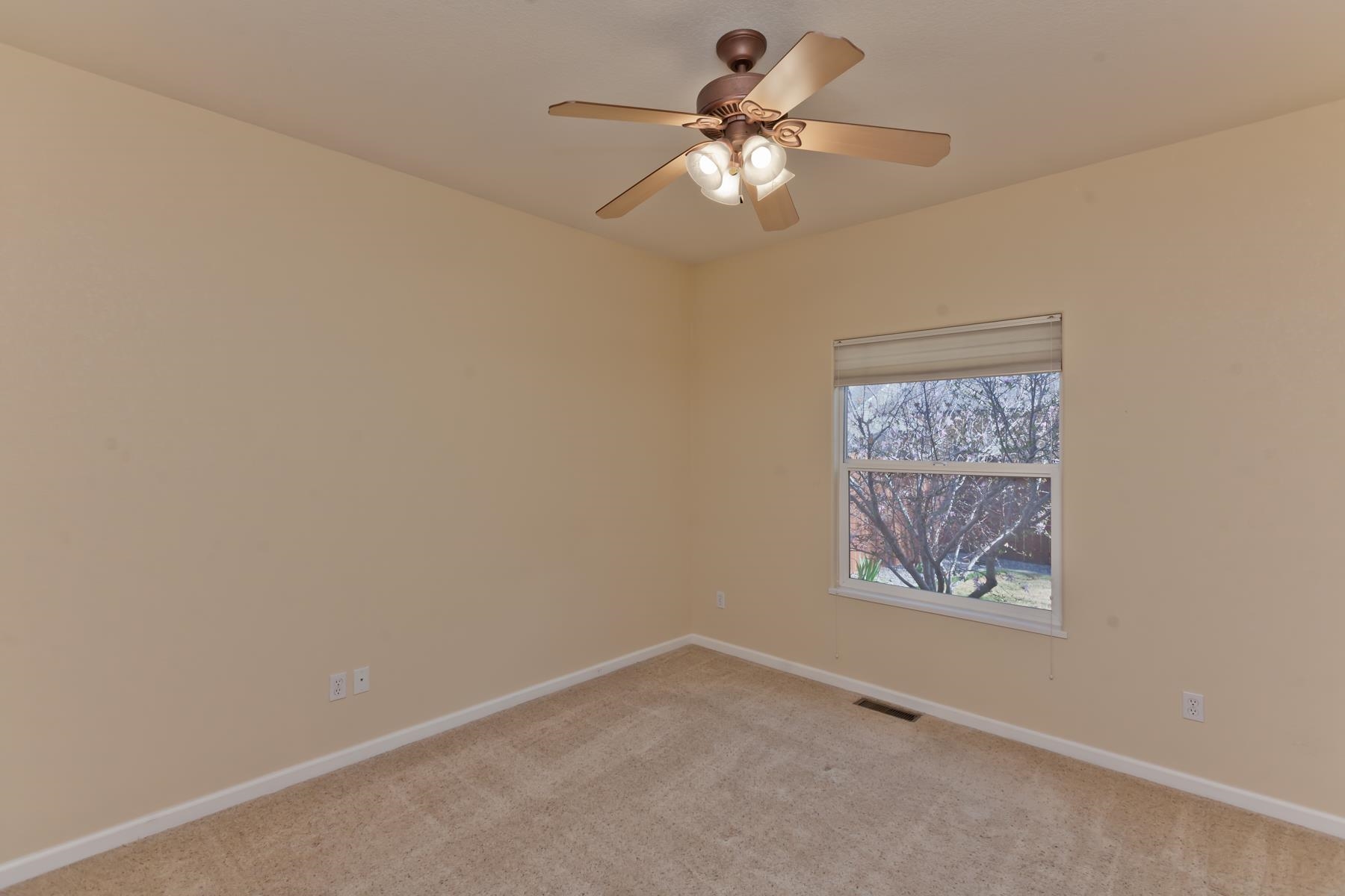 2433 Jack Creek Road Grand Junction, CO 81505 - Photo 24 of 41 an empty room with a window
