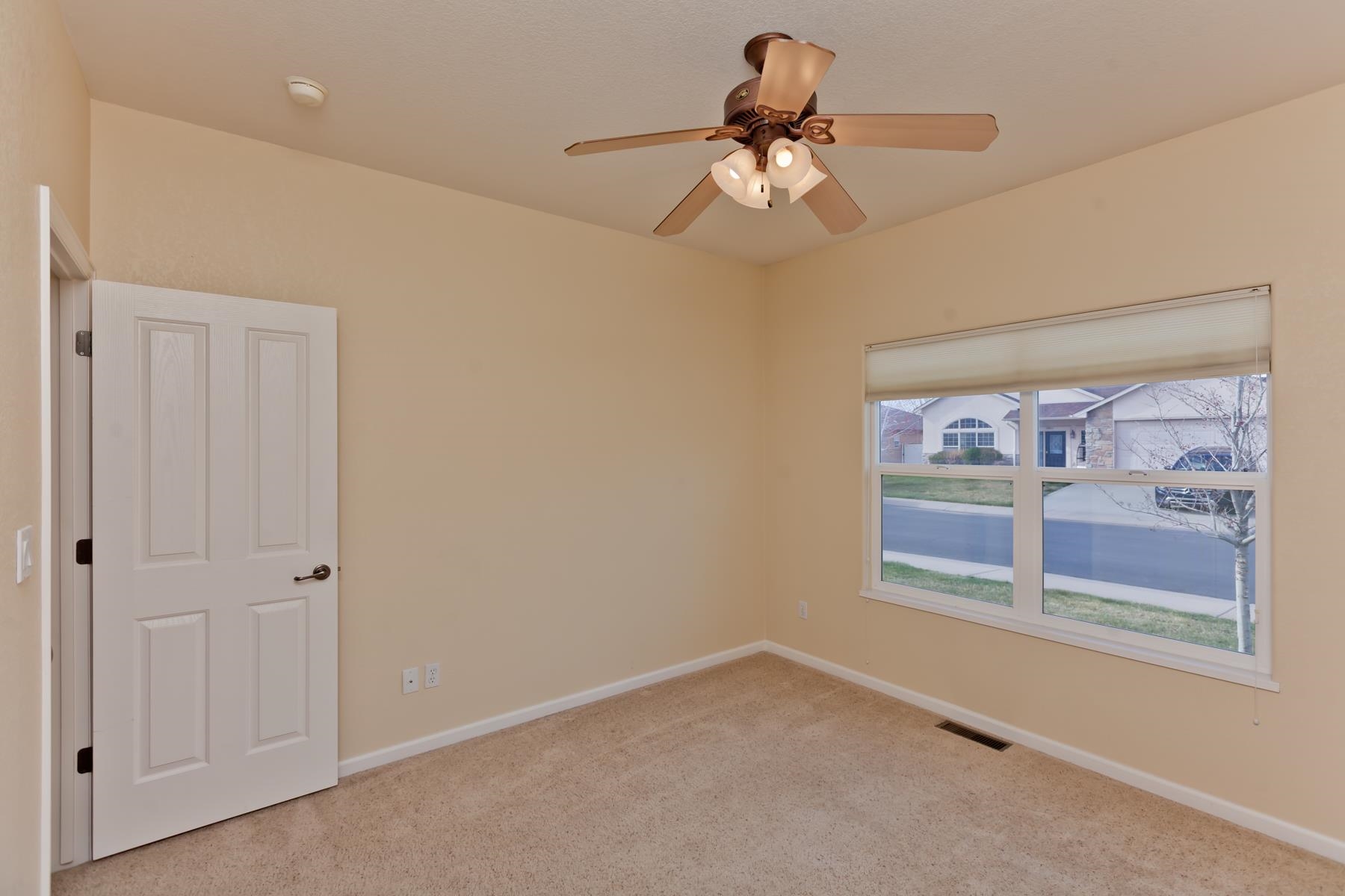 2433 Jack Creek Road Grand Junction, CO 81505 - Photo 25 of 41 a view of a livingroom with a fan
