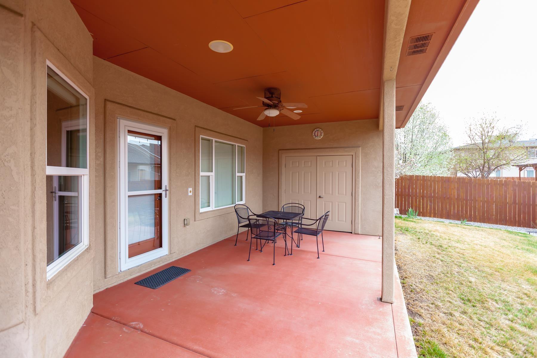 2433 Jack Creek Road Grand Junction, CO 81505 - Photo 39 of 41 a view of a porch with furniture and a yard