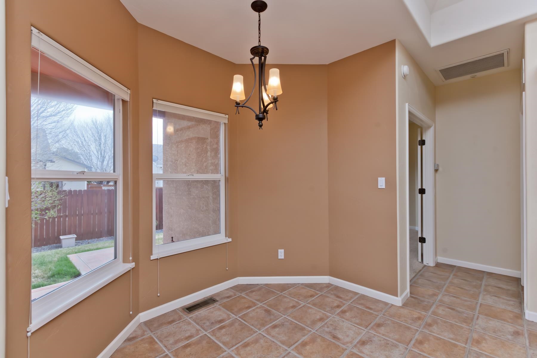2433 Jack Creek Road Grand Junction, CO 81505 - Photo 7 of 41 a view of an empty room with a window