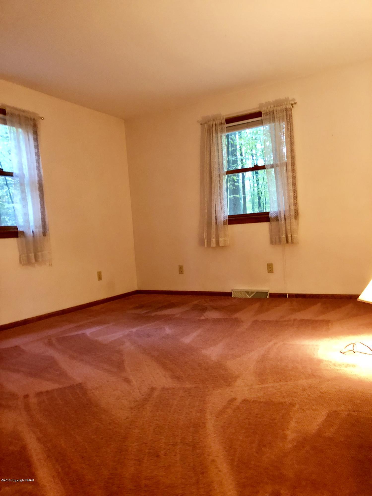 322 Charles Folly Road Bartonsville, PA 18321 - Photo 20 of 25 an empty room with a window