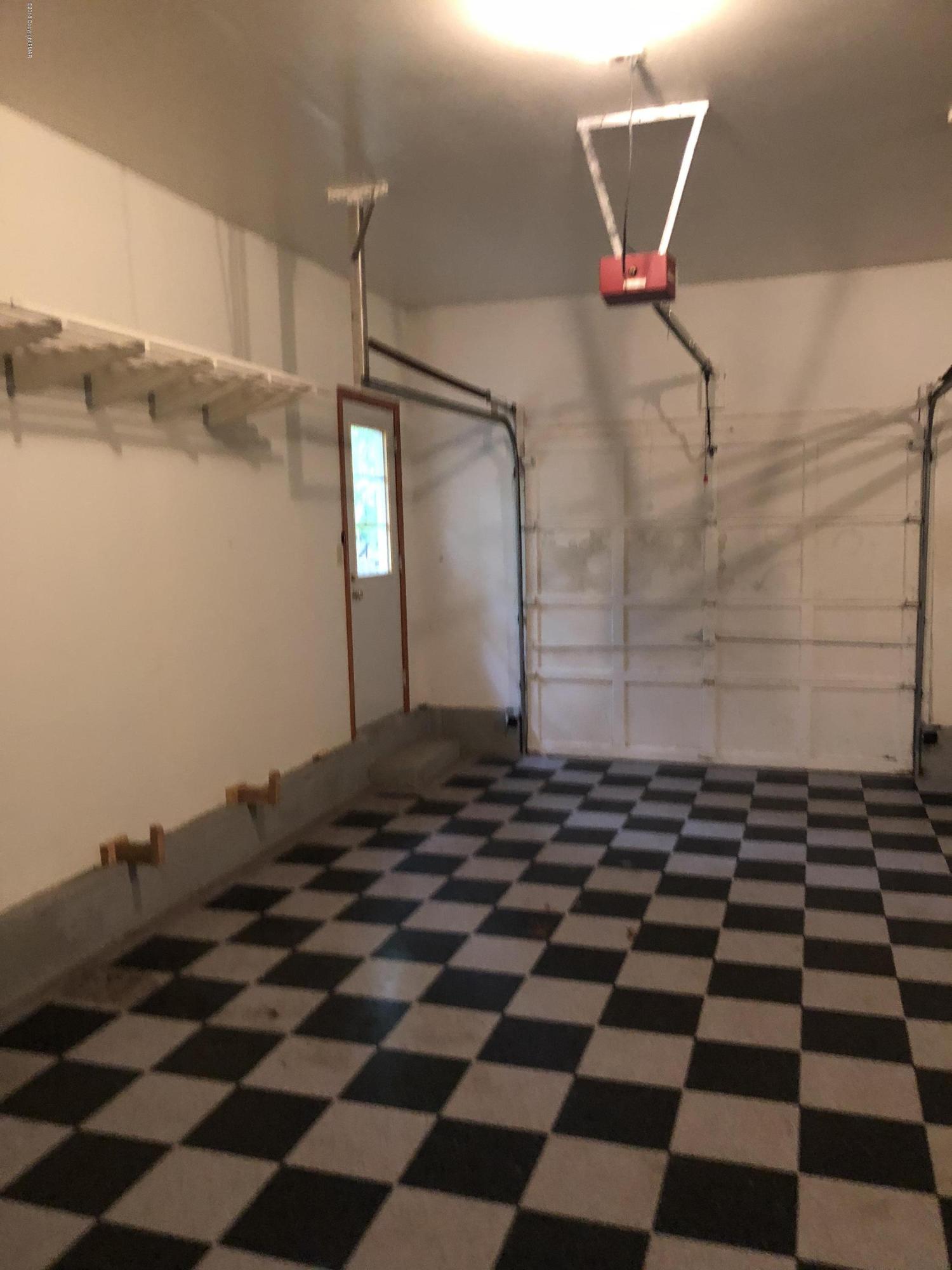 322 Charles Folly Road Bartonsville, PA 18321 - Photo 24 of 25 a room with a black white checkered floor