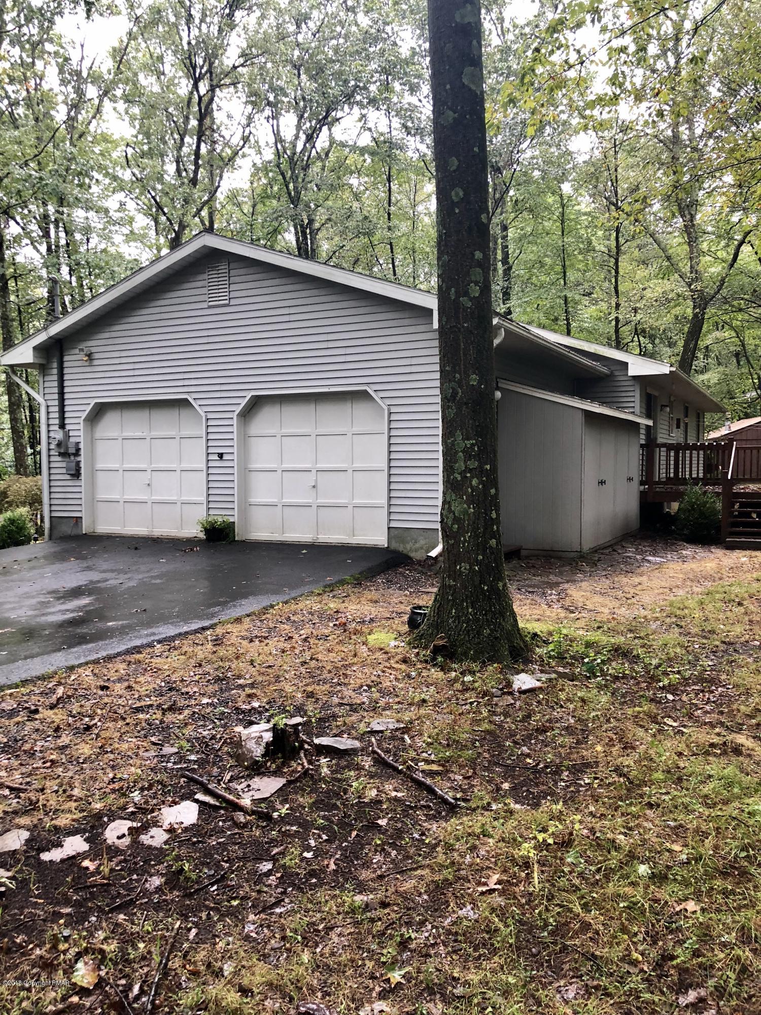 322 Charles Folly Road Bartonsville, PA 18321 - Photo 5 of 25 a house with trees in the background