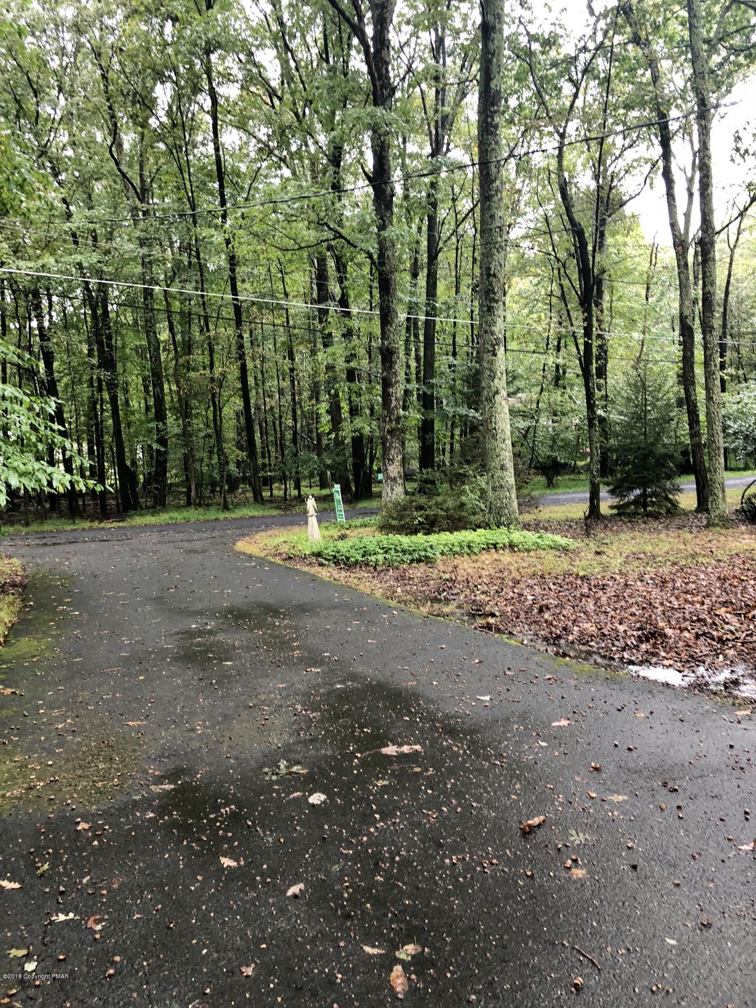 322 Charles Folly Road Bartonsville, PA 18321 - Photo 6 of 25 a backyard of a house with lots of green space