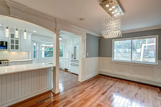 a kitchen with a stove and a sink